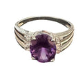 Amethyst solitarie ring flat lay