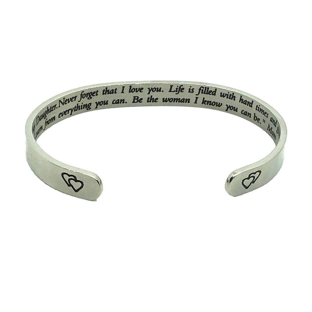 Silver bracelet with engraved text and heart symbols on a white background