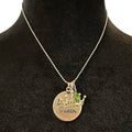 Necklace with a pendant on a black mannequin bust