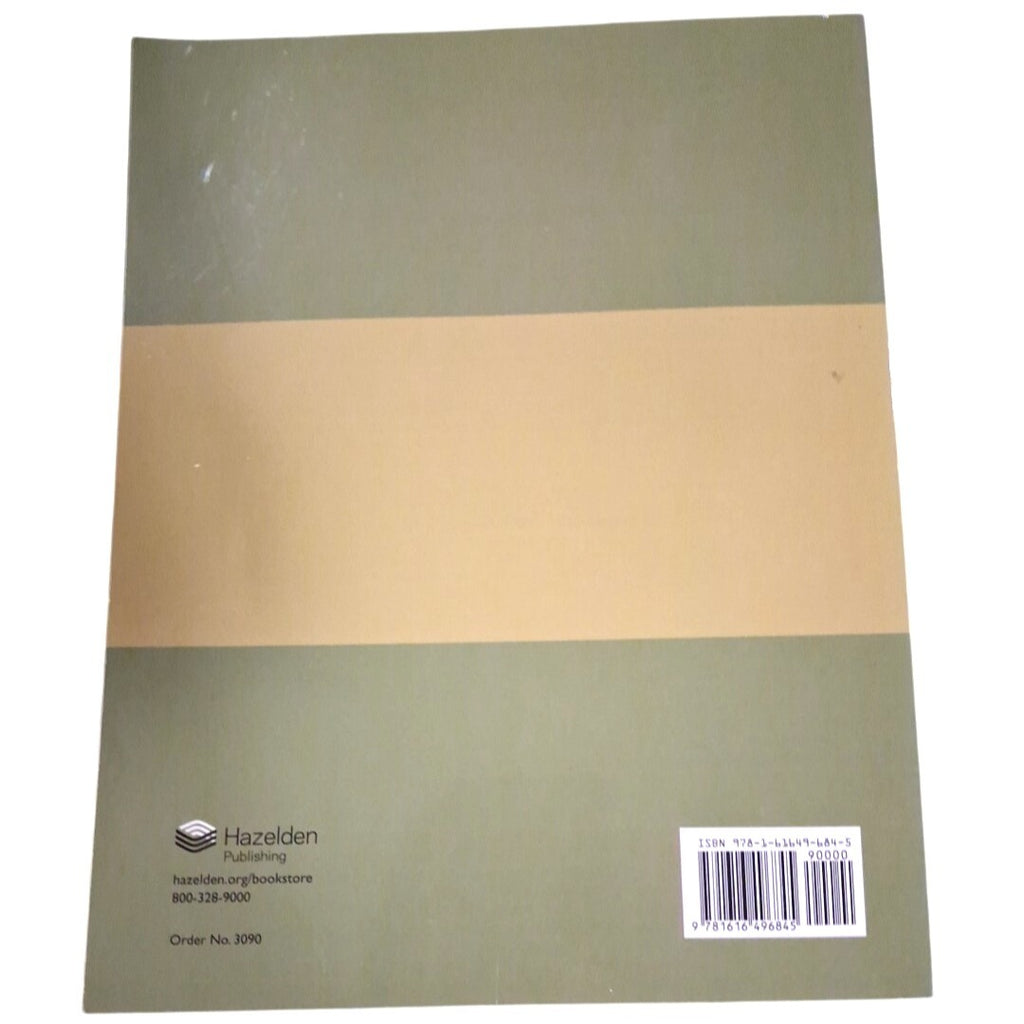 Notebook with a green and beige cover and Hazelden branding on a white background