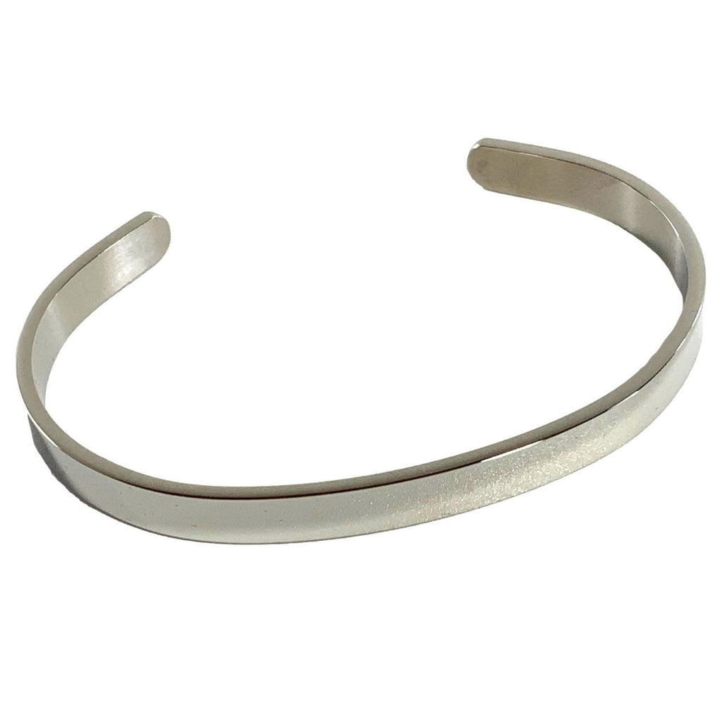 Silver bangle on a white background