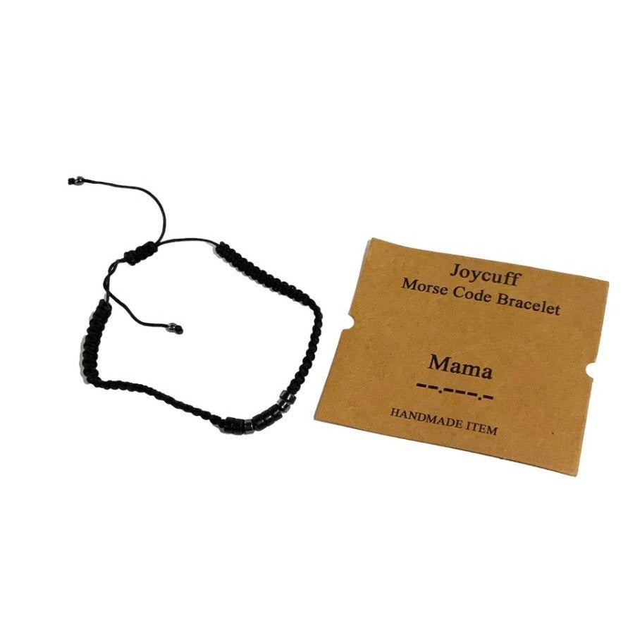 Black beaded bracelet with a brown card labeled 'Joycuff Morse Code Bracelet Mama' on a white background