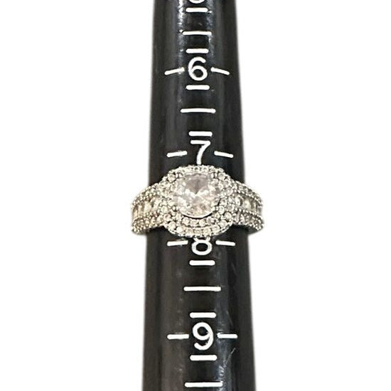 Diamond ring on a black ring sizer with measurement markings