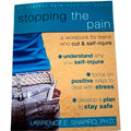 Book cover of 'Stopping the Pain' by Lawrence E. Shapiro, PH.D., with a person holding a knife.
