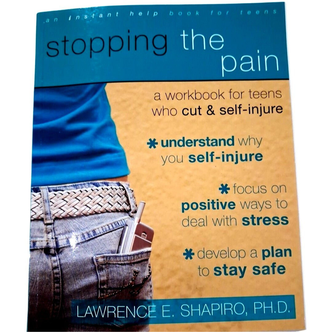 Book cover of 'Stopping the Pain' by Lawrence E. Shapiro, PH.D., with a person holding a knife.