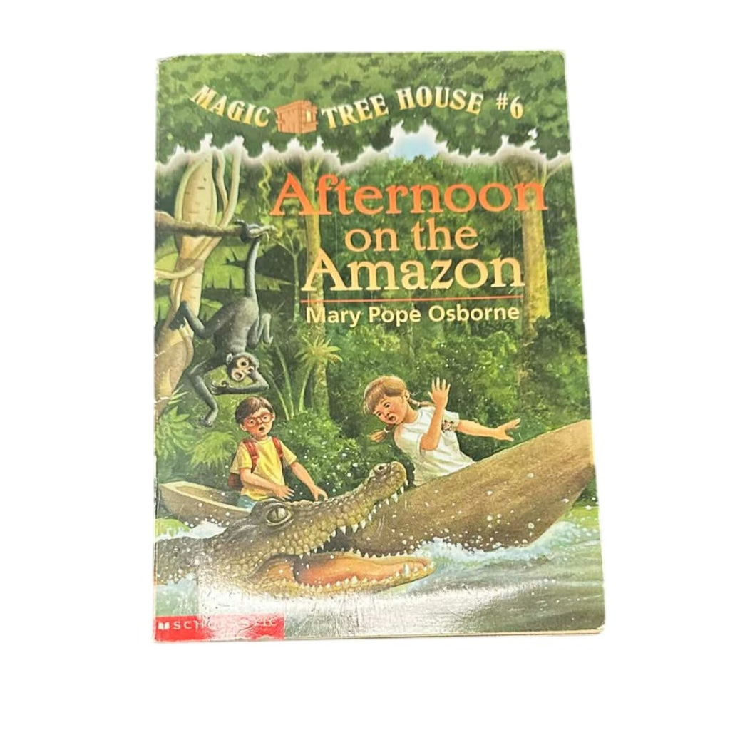 Book cover of 'Afternoon on the Amazon' from the Magic Tree House series by Mary Pope Osborne.