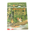 Book cover of 'Afternoon on the Amazon' from the Magic Tree House series by Mary Pope Osborne.